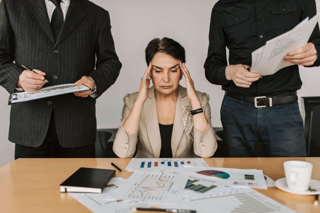 Employee overwhelmed with planning a corporate event. 